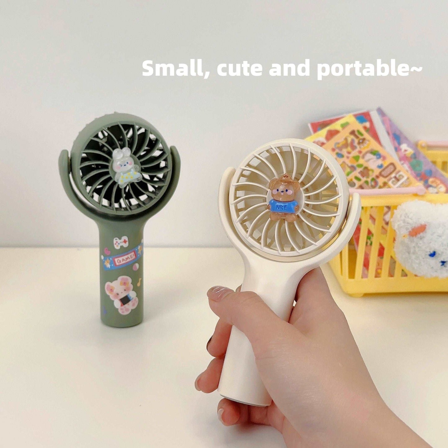 Handheld rotatable mini fan