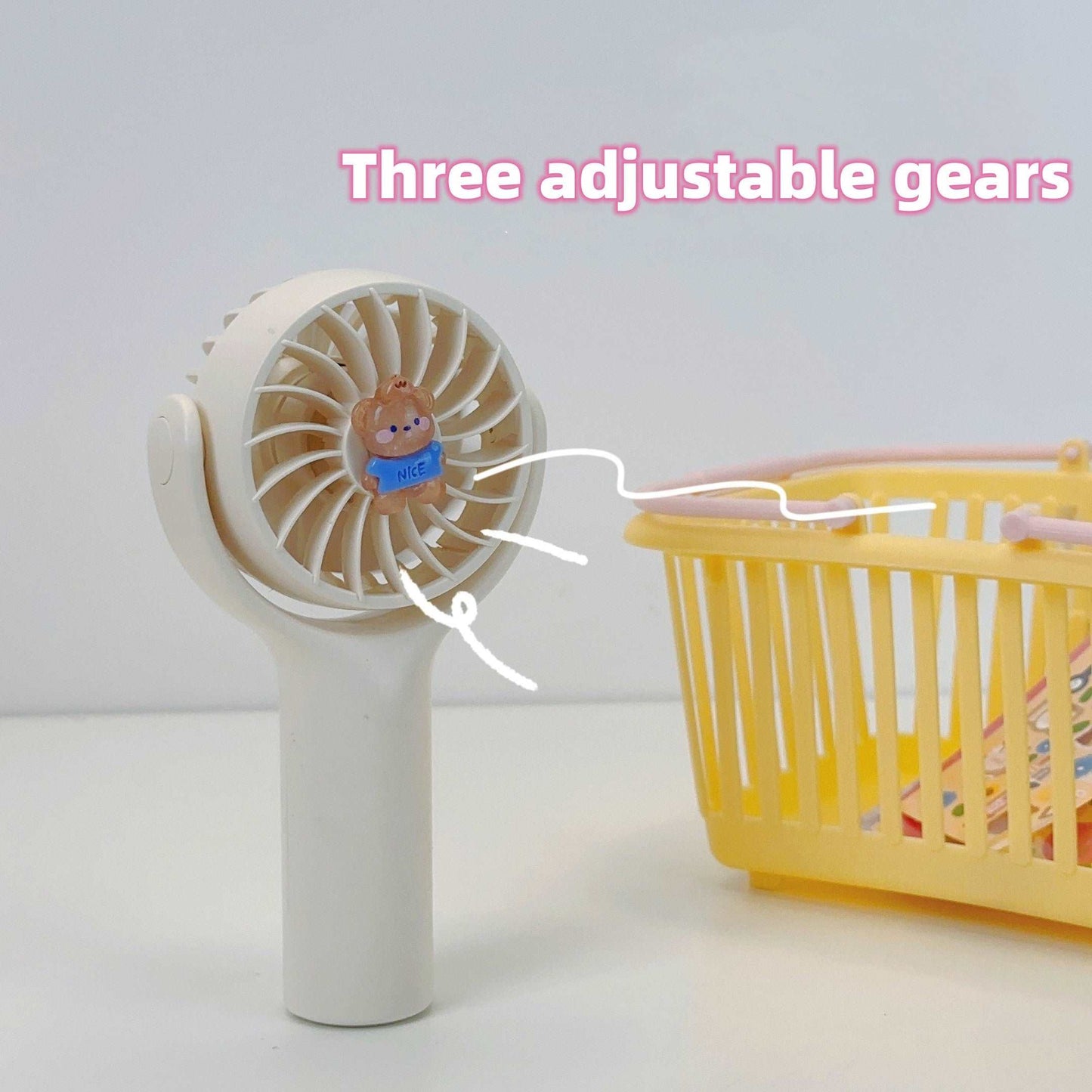 Handheld rotatable mini fan
