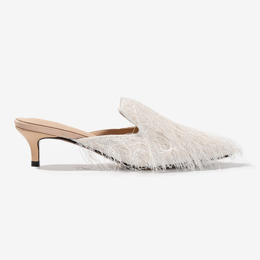 Silken Tassel – Ivory Fringe Mules with Eastern Flair