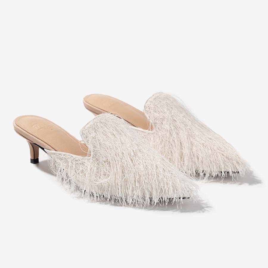 Silken Tassel – Ivory Fringe Mules with Eastern Flair