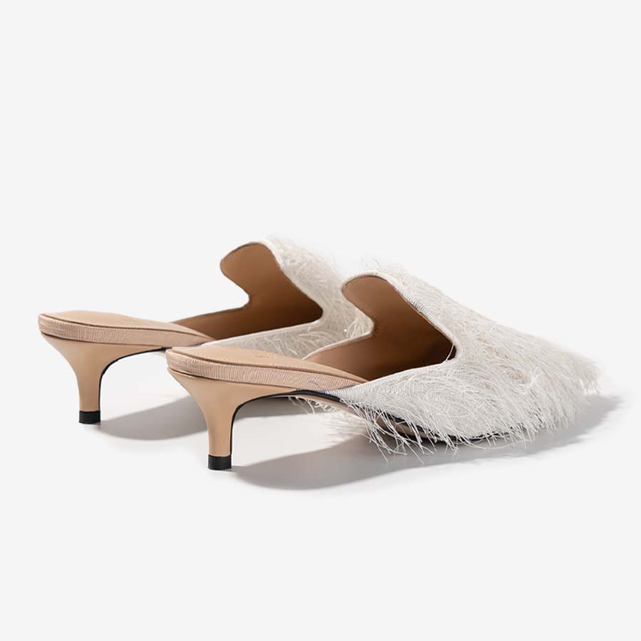 Silken Tassel – Ivory Fringe Mules with Eastern Flair